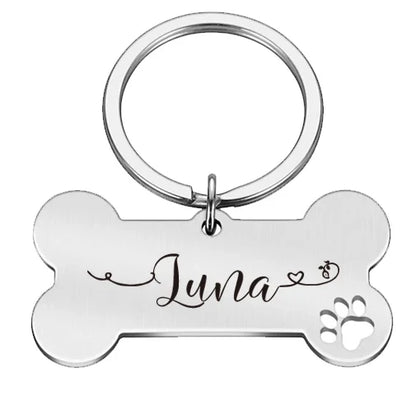 Silver name tag, front engraved with the pet's name