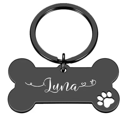 Black name tag, front engraved with the pet's name